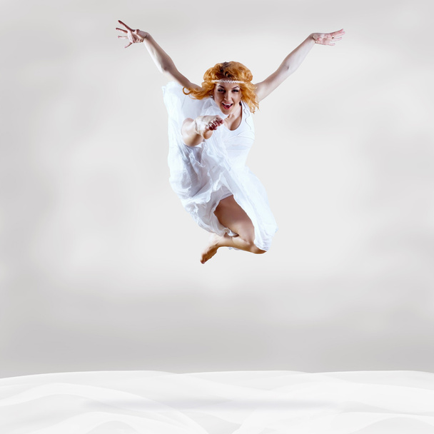 Jump of ballerina with dress of milk - Zdjęcie, obraz