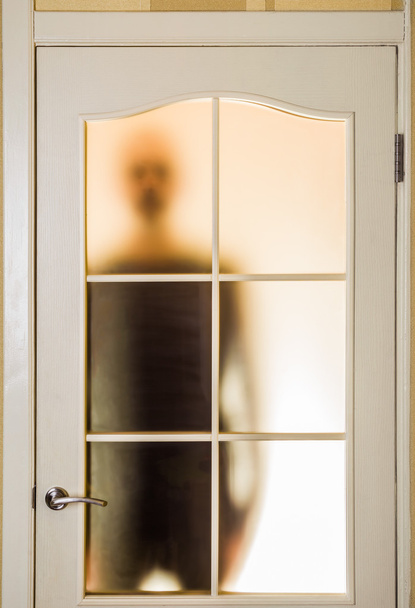 Homem atrás da Porta de Vidro
 - Foto, Imagem