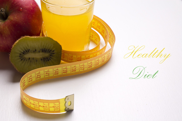 Fruit with tape measure isolated - Photo, Image