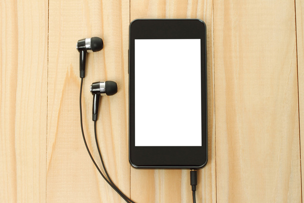 Teléfono inteligente con auriculares
 - Foto, imagen