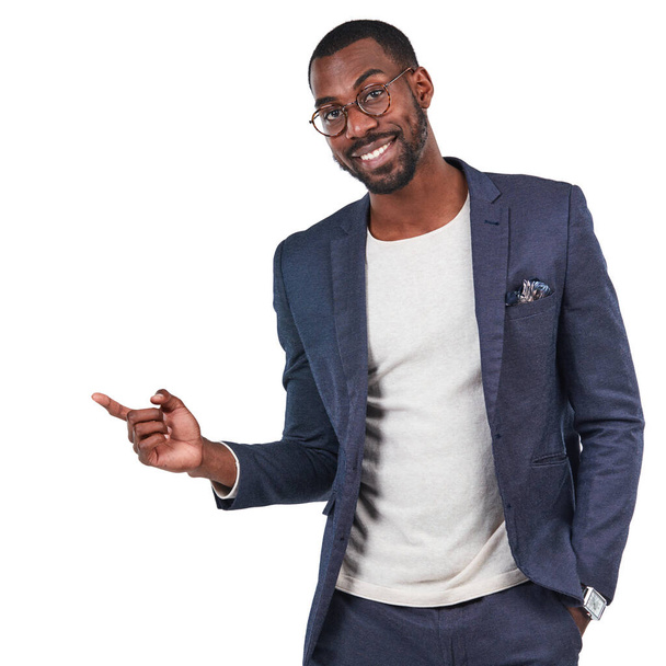 Black businessman, portrait or pointing finger on isolated white background, marketing space or advertising mockup. Smile, happy or creative designer and hand gesture for branding sales deal or promo. - Zdjęcie, obraz