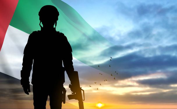 Silhouette of a soldier on background of the sunrise and UAE flag. Concept for Commemoration Day, Martyrs Day. EPS10 vector - Vektor, obrázek