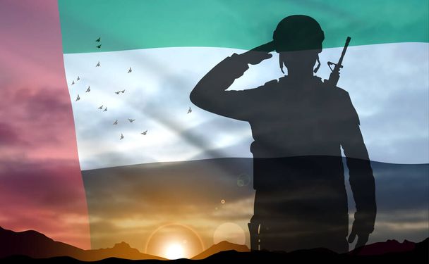 Silhouette of a soldier on background of the sunrise and UAE flag. Armed forces of United Arab Emirates. Concept for Commemoration Day, Martyrs Day. EPS10 vector - Vector, Image