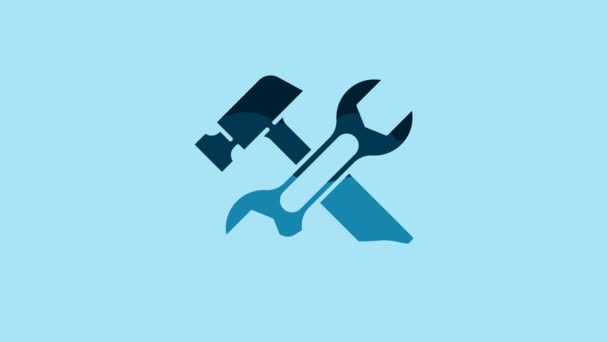 Blue Crossed hammer and wrench spanner icon isolated on blue background. Hardware tools. 4K Video motion graphic animation . - Záběry, video