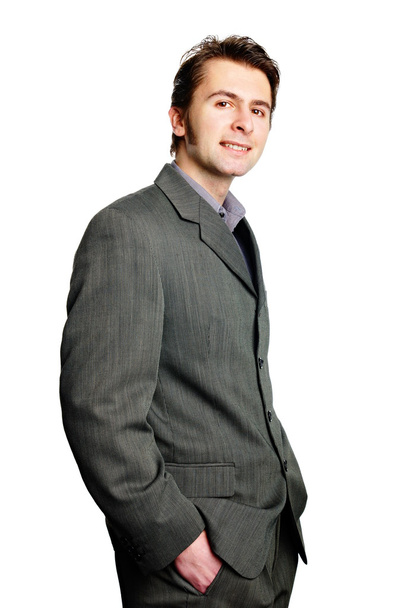 Handsome businessman with hands in pockets - Photo, Image
