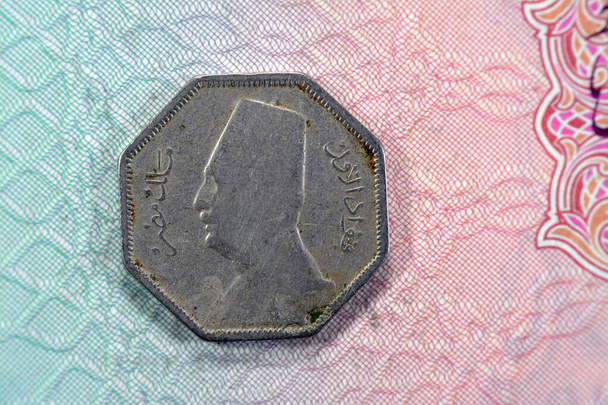 Octagonal old Egyptian coin of two and half  milliemes series 1933 AD 1352 AH features king Fuad I of Egypt on obverse side and value with date on the reverse side, vintage retro old Egyptian coin - Fotoğraf, Görsel
