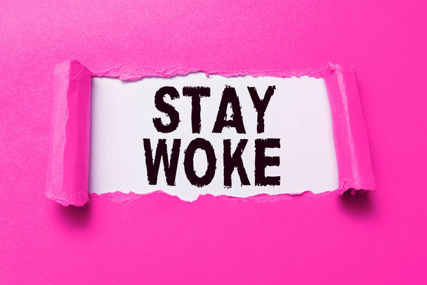 Текстовая подпись с надписью Stay Woke, Business showcase being aware of your surroundings and things going on Keep informed - Фото, изображение