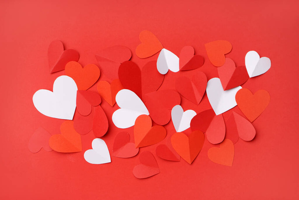 Beautiful paper hearts on red background. Valentines Day celebration - Foto, immagini