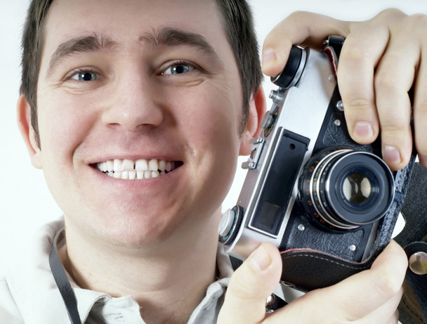 Happiness man with vintage photo camera. - Foto, Imagen