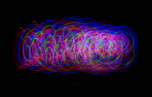 Abstract background with multi color lights on dark screen. - Foto, imagen