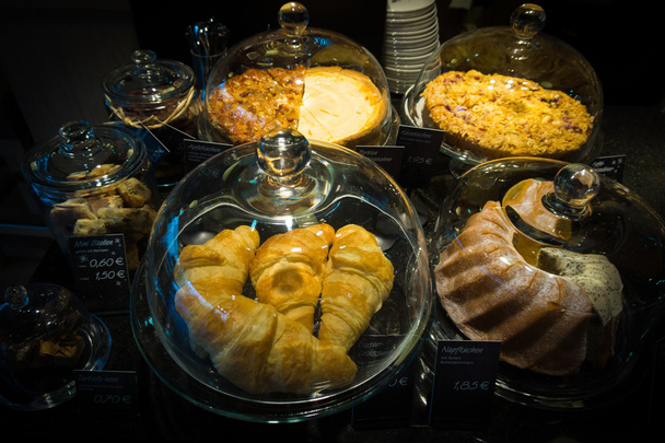 Cakes under bell-glass - Photo, image