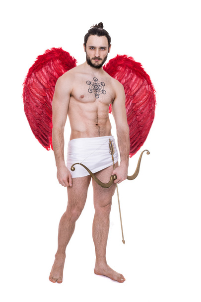 Portrait of a beautiful young man with angel's wings.  Cupid, Valentine, Archangel - Φωτογραφία, εικόνα