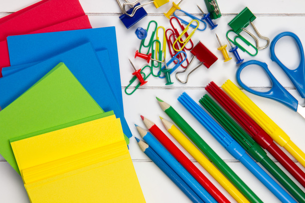 colorful school requisites on a desk - Foto, afbeelding