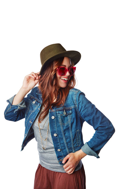 Fashion, style and woman in a studio with a casual, stylish and funky outfit with accessories. Happiness, smile and female model with hat, sunglasses and edgy clothes isolated by a white background - Fotó, kép