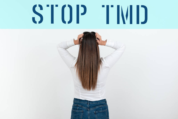 Text sign showing Stop Tmd, Concept meaning Prevent the disorder or problem affecting the chewing muscles - Fotoğraf, Görsel