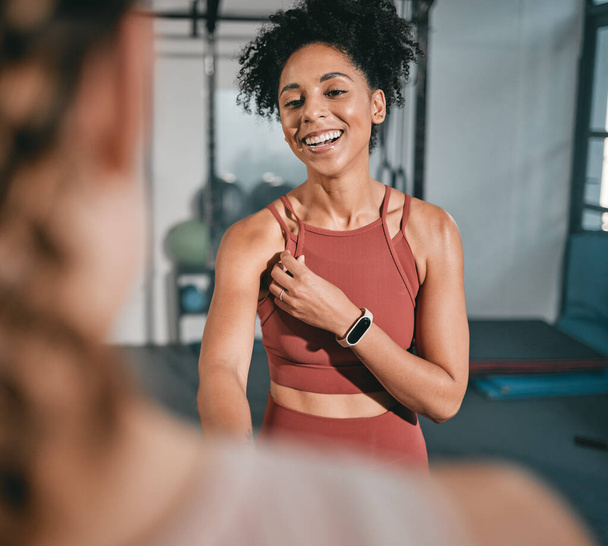 Fitness, personal trainer and black woman shaking hands at gym for team work, trust or support in a workout or exercise. Collaboration, friends or healthy sports athletes handshake in training club. - Foto, afbeelding