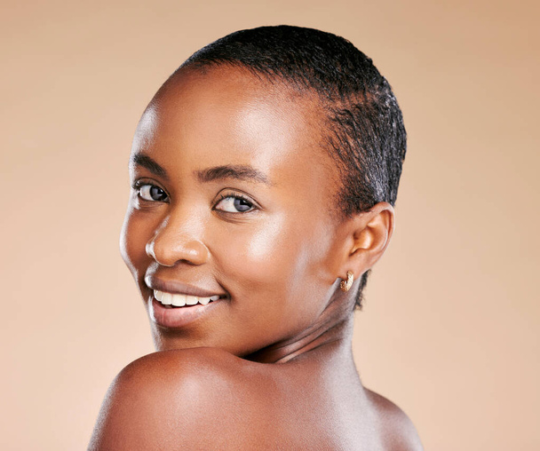 Black woman, model and skincare portrait with smile, healthy cosmetic glow on skin by beige background. Happy African model, girl and beauty with makeup, natural aesthetic and cosmetics for self love. - Photo, image