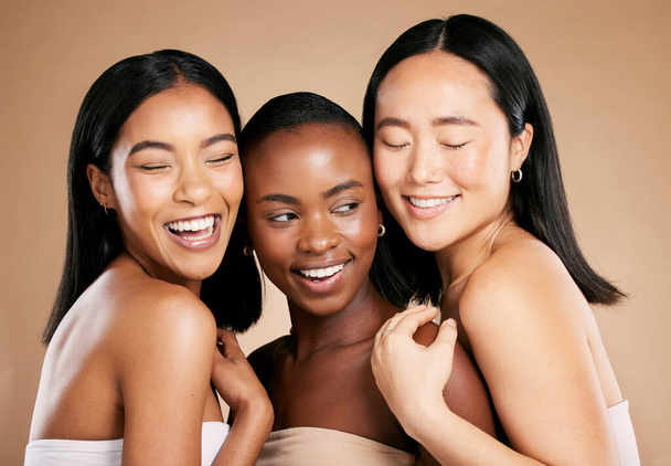 Skincare, beauty and diversity, happy women with smile and eyes closed on studio background. Health, wellness and luxury cosmetics, healthy skin care and beautiful, friendly people in natural makeup. - Foto, Bild