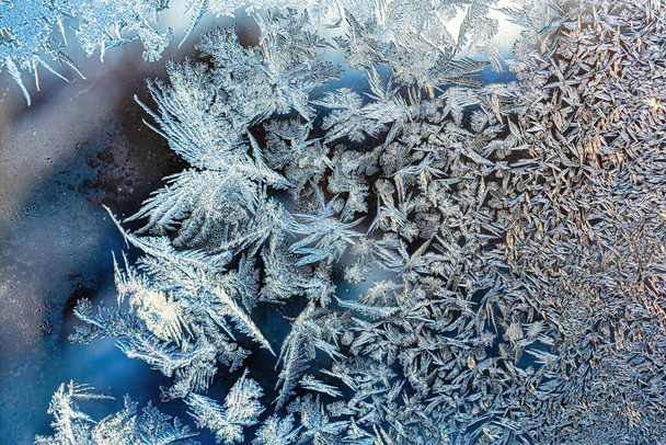 Frost texture on frozen glass in winter. Winter background.             - Photo, image