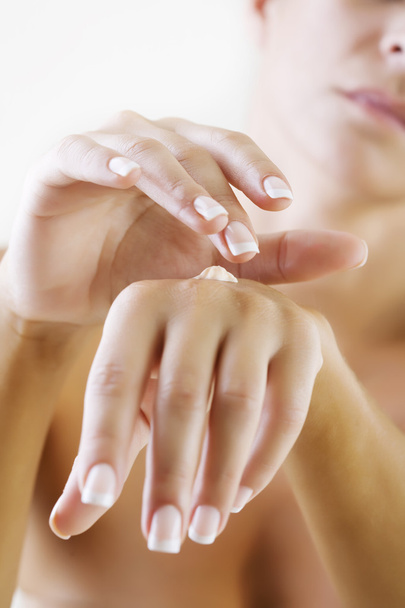 Applying hand lotion - Photo, Image