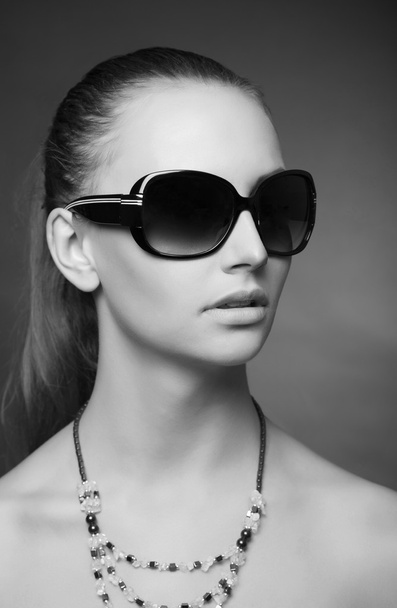 Fashionable shot of a girl with glasses - Foto, imagen