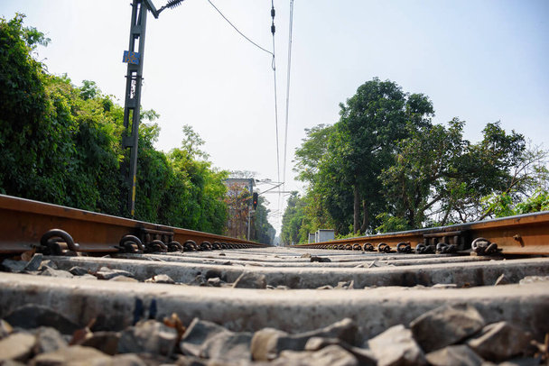 Picture of a rail anchor on a railway track of Indian Railways system. - Φωτογραφία, εικόνα