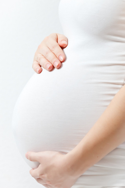 έγκυος γυναίκα συγκινητικό εδώ κοιλιά - Φωτογραφία, εικόνα