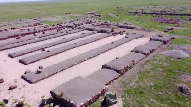 Akyrtas Palace complex near Taraz city in Kazakhstan. Ruined walls of ancient Arabic palace. Archaeological excavations of ancient ruins. 17.04.2022, Taraz, Kazakhstan. - Footage, Video