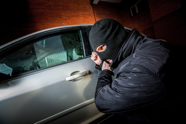Car thief in a mask. - Fotografie, Obrázek