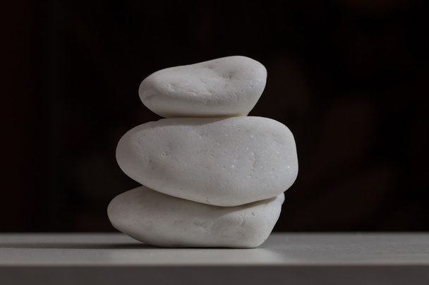 Spa stones on a towel - Foto, Bild