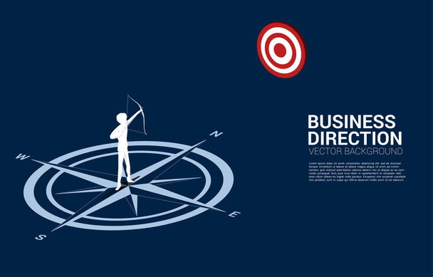 Businessman in suit shoot the arrow to target standing at center of compass on floor.Concept of career path and business direction. - Vector, Imagen