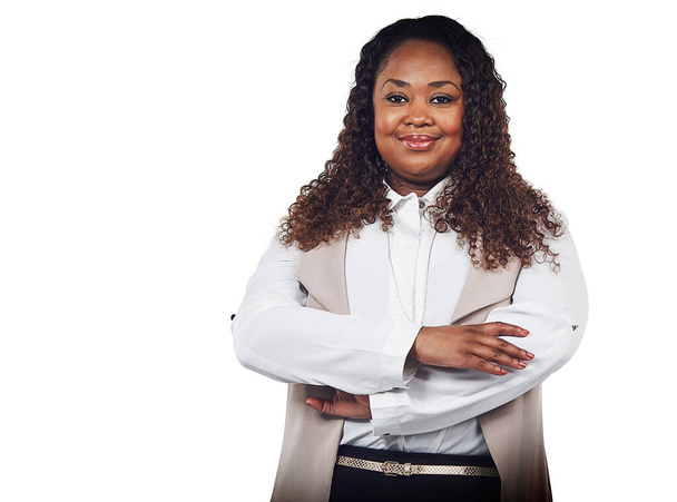 Smile, portrait and business woman in studio, proud and empowered against a white background. Happy, leader and confident black woman with ambitious, goal and mindset standing, confident and isolated. - Photo, image