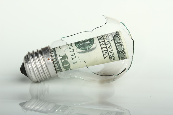 Сломанная лампа с долларом
 - Фото, изображение