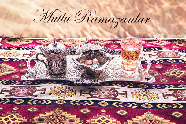 Turkish coffee with sweets on silver tray Multu Ramazanlar greeting - Photo, Image