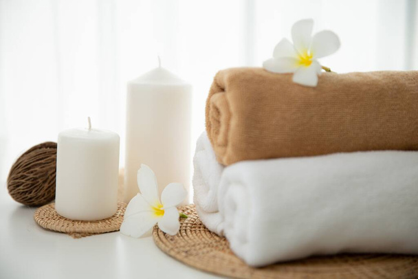 Spa accessory composition set in day spa hotel , beauty wellness center . Spa product are placed in luxury spa resort room , ready for massage therapy from professional service . - Foto, Bild