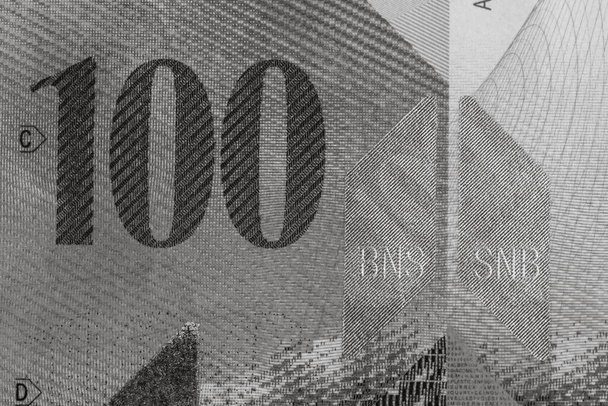 Κοντινό πλάνο μακροεντολή των χαρτονομισμάτων CHF, λεπτομέρεια φωτογραφία του ελβετικού φράγκου. Παγκόσμια έννοια του χρήματος, πληθωρισμός και οικονομία - Φωτογραφία, εικόνα