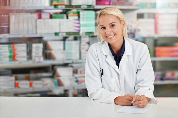 Pharmacist, happy portrait and medical worker ready for medical support, wellness and standing pharmaceutical drug store. Woman, nurse smile and healthcare medicine industry for pharmacy headshot. - Foto, immagini
