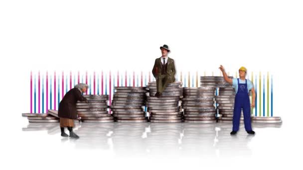 Pile of coins and miniature people with graphics. Concept of income disparity. - Filmagem, Vídeo