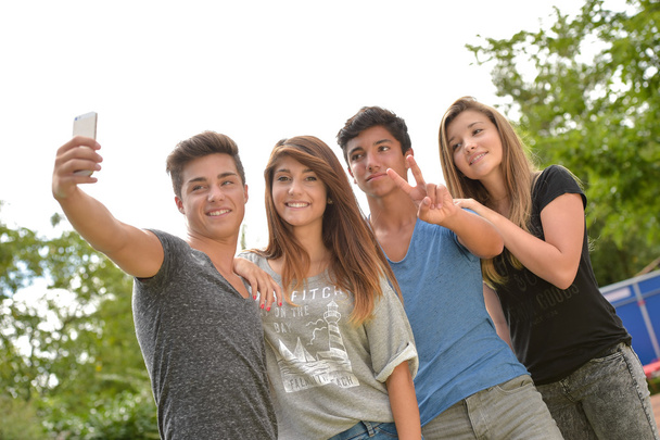 Cheerful teenager friends taking selfie - Fotoğraf, Görsel