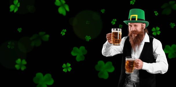 Bearded man with beer on dark background. Banner for St. Patrick's Day - Valokuva, kuva