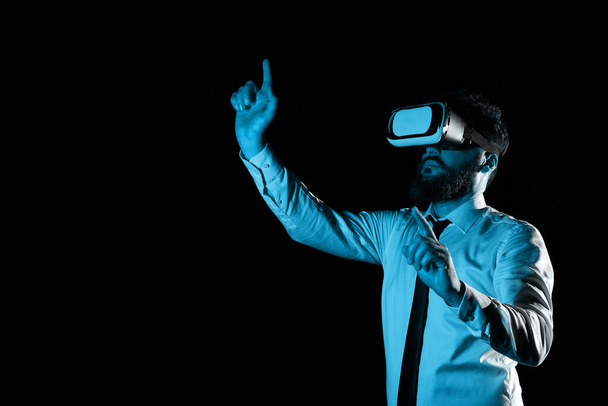 Man Wearing Vr Glasses And Pointing On Important Messages With two Fingers. - Photo, image