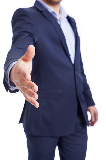 Businessman giving his hand - Photo, image