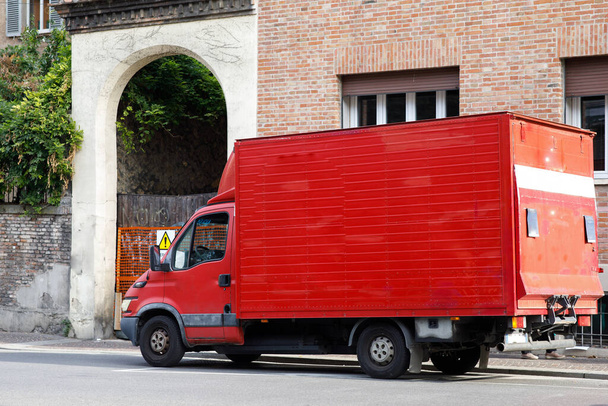 red truck on the road. High quality photo - Φωτογραφία, εικόνα