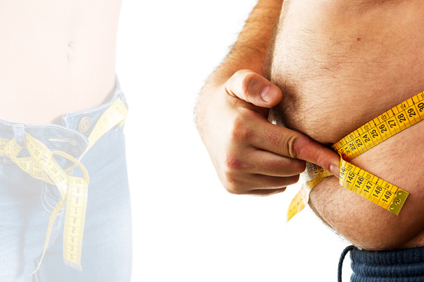 big man measuring his belly with a measuring tape  - Photo, Image