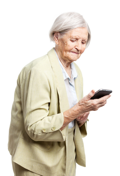 Seniorin benutzt Handy - Foto, Bild