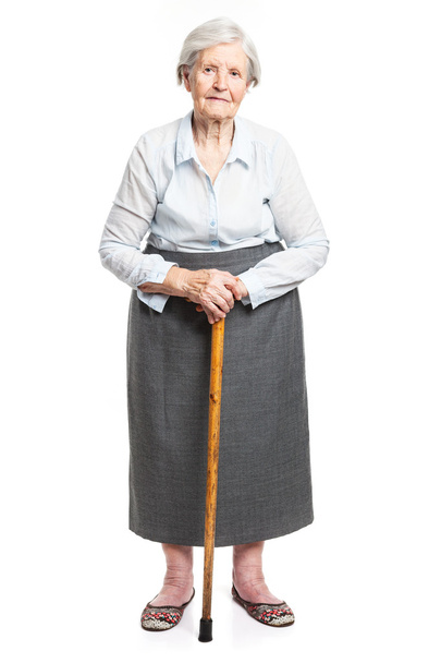 Senior nainen kävelykeppi seisoo valkoinen - Valokuva, kuva