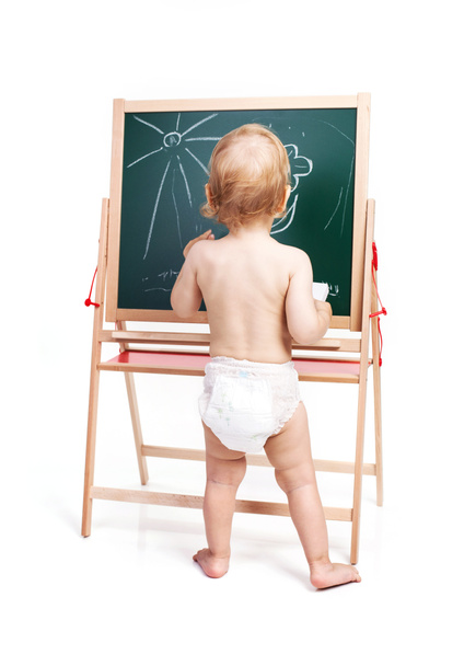 Babyjongen puttend uit schoolbord over Wit - Foto, afbeelding