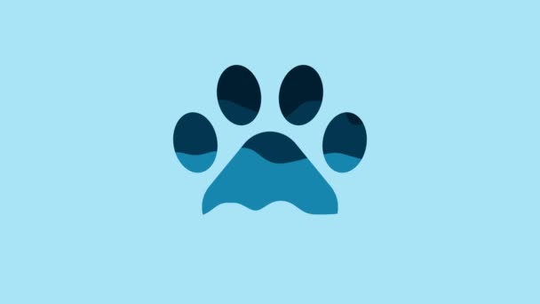 Blue Paw print icon isolated on blue background. Dog or cat paw print. Animal track. 4K Video motion graphic animation. - Záběry, video