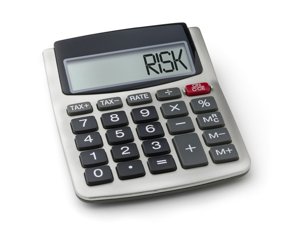 Calculator met het woordrisico op het display - Foto, afbeelding