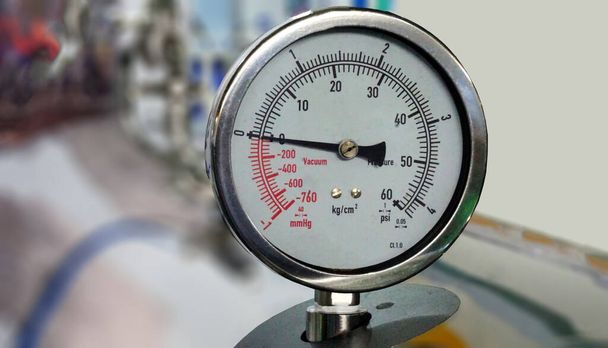 Close-up view of analog pressure gauge meter in an industry                                - Photo, Image